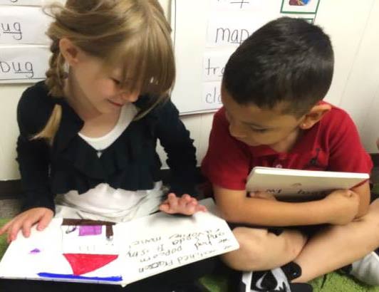 reading their published books to their kindergarten friends.