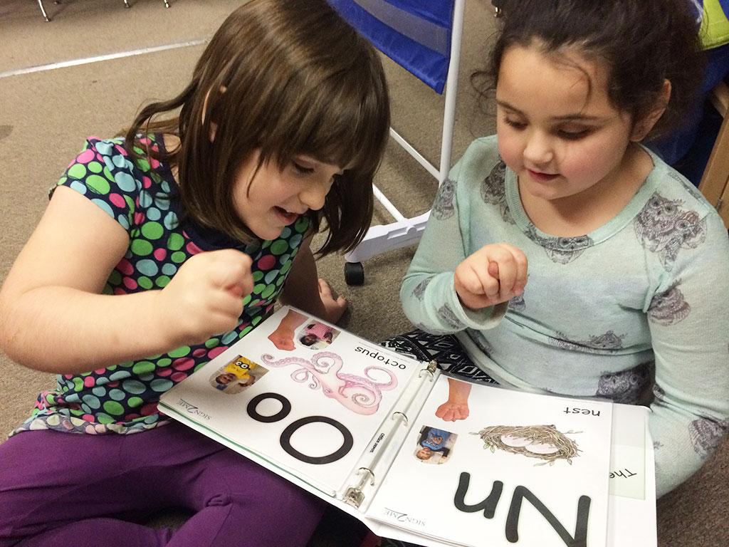 children learning sign language